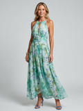 Portia | Vestito Midi Plissettato con Collo Halter e Stampa Floreale - Eleganza e Stile per Ogni Occasione!